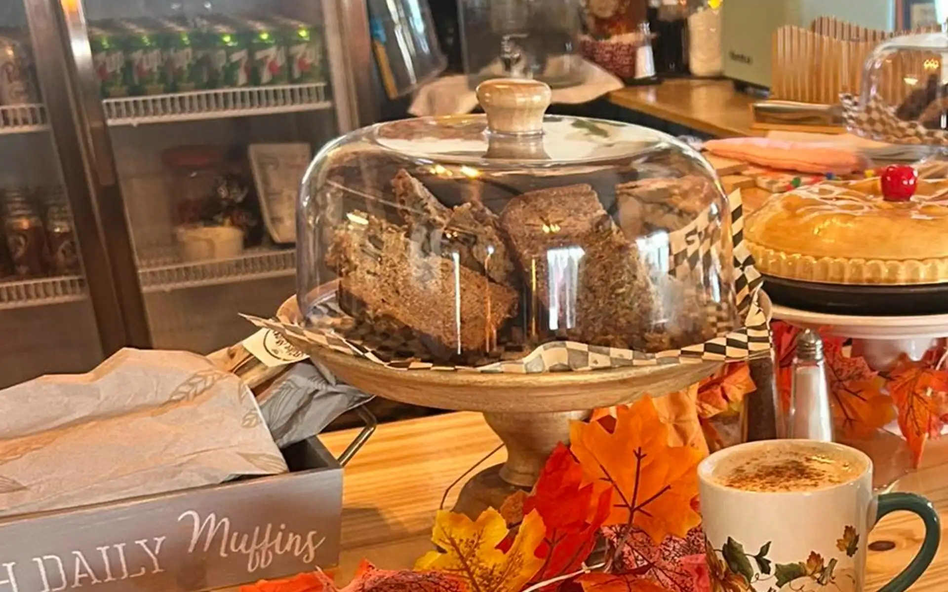 Autumn display of baked goods, pie and coffee